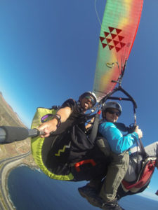 paragliding with a pilot instructor in a tandem